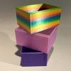 Three Nock Deck Blocks stacked. Rainbow at the top, sparkly pink and purple below.